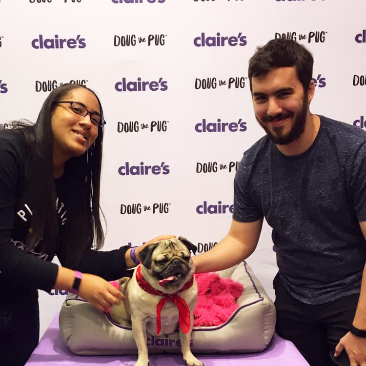 Camisha, Doug the Pug, and Chris at a Doug the Pug meet and Greet event.